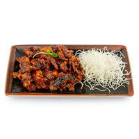 Crispy beef with eggplants in honey-tomato sauce Singapore style